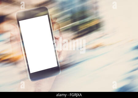 Immagine composita della mano femminile dello smartphone di contenimento Foto Stock