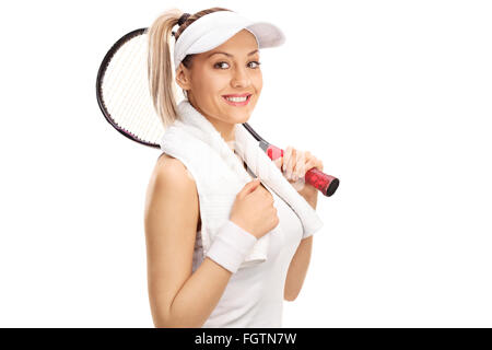 Studio shot di una giovane donna tennis payer tenendo un racket isolati su sfondo bianco Foto Stock