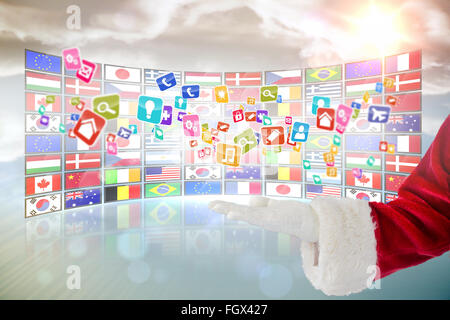 Immagine composita di santa claus presentando con la mano Foto Stock