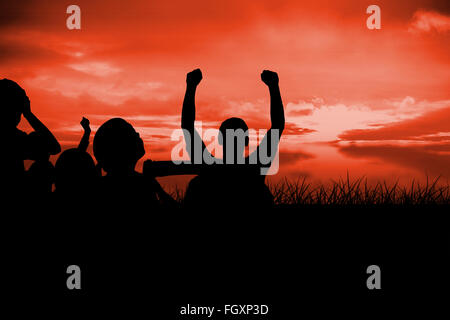 Immagine composita di sagome dei tifosi di calcio Foto Stock