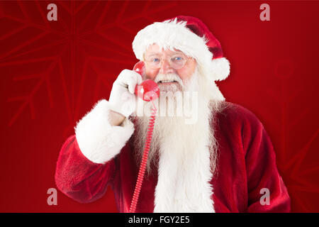 Immagine composita di Babbo Natale sul telefono Foto Stock