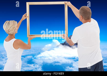 Immagine composita della coppia matura di riagganciare cornice immagine Foto Stock