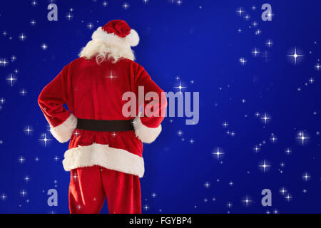 Immagine composita della vista posteriore di Babbo Natale Foto Stock