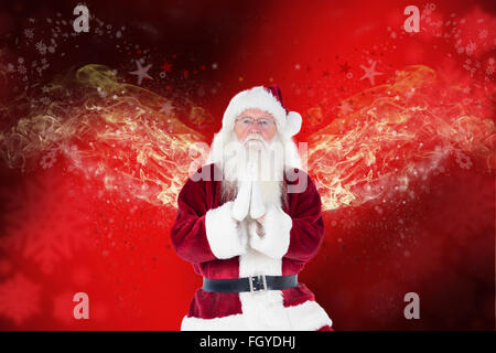 Immagine composita di Babbo Natale facendo un po' di yoga Foto Stock