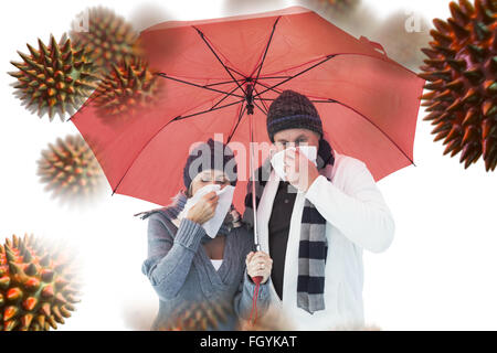 Immagine composita della coppia matura soffia il naso sotto ombrellone Foto Stock