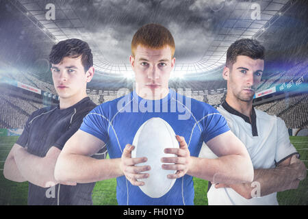 Immagine composita di agguerriti giocatori di rugby Foto Stock