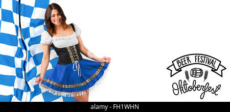 Immagine composita della bella ragazza oktoberfest diffusione gonna Foto Stock