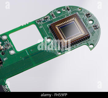 Il sensore di formazione di immagini e la scheda di circuito da una fotocamera digitale compatta Foto Stock