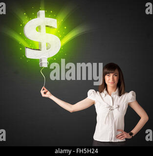 Imprenditrice con il segno del dollaro palloncino Foto Stock