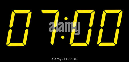 Display elettronico mostra il tempo in sette del mattino. Isolato su sfondo nero Foto Stock
