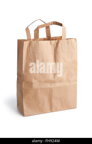 Vuoto di carta marrone shopping bag su sfondo bianco Foto Stock