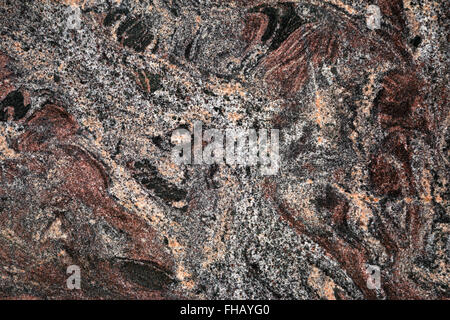 Modello di uno in marmo scuro, levigata liscia lastra di pietra in rosso marrone e nero con il grigio e arancione pallido Foto Stock