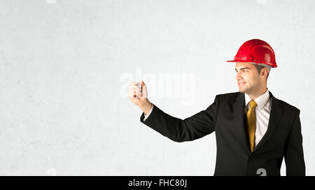 Giovane architetto disegno nello spazio vuoto Foto Stock