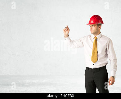 Giovane architetto disegno nello spazio vuoto Foto Stock