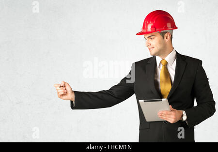 Giovane architetto disegno nello spazio vuoto Foto Stock