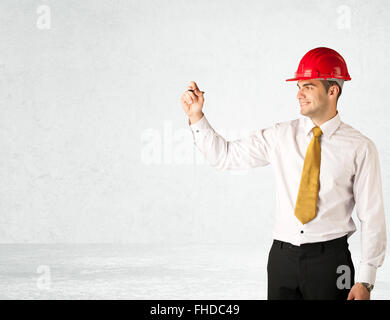 Giovane architetto disegno nello spazio vuoto Foto Stock