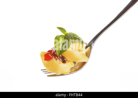 Tortellini sulla forcella. Foto Stock