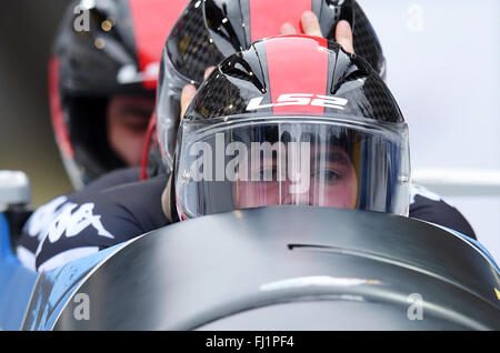 Koenigssee, Germania. 28 Feb, 2016. Austrian bobber Benjamin Maier, Marco Rangl, Markus Sammer, e ione Danut moldavi decollare durante il bob di Coppa del Mondo a Koenigssee, Germania, 28 febbraio 2016. Foto: TOBIAS HASE/dpa/Alamy Live News Foto Stock