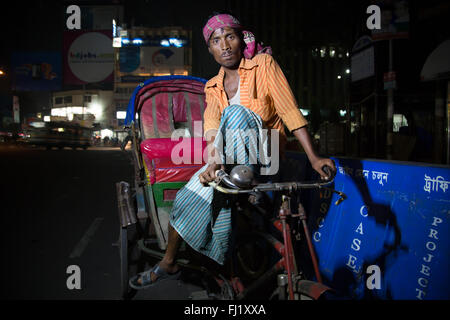 In rickshaw driver nella zona Motijheel , Dhaka , Bangladesh Foto Stock