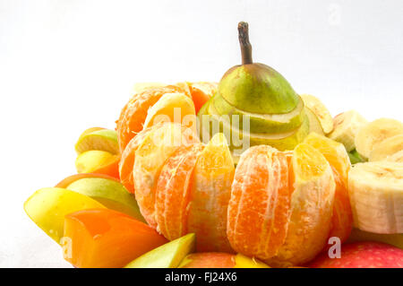 Assortimento di frutta esotica su sfondo bianco Foto Stock