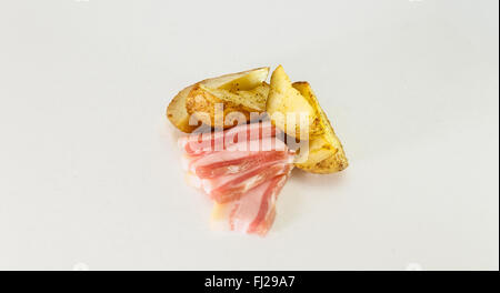 La pancetta potato in villaggio Foto Stock