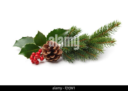 Decorazione di natale di holly berry e cono di pino Foto Stock