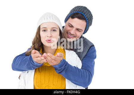 Coppia felice soffiando kiss Foto Stock