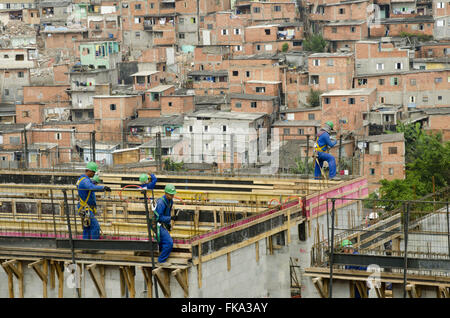 Riqualificazione delle baraccopoli - Progetto Nuovo Paraisópolis - programma comunale per la baraccopoli di eseguire l'aggiornamento Foto Stock