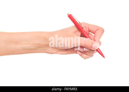 Mano femmina trattiene penna rossa. Foto Stock