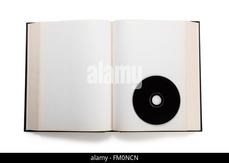 Aprire il libro e compact disk, concetto di informazioni digitali. Foto Stock