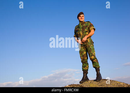 Militari nella sommità di una montagna Foto Stock