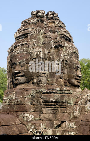 Faccia sculture nel tempio Bayon - Angkor Thom vicino a Siem Reap, Cambogia Foto Stock