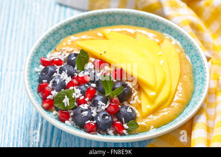 Mango Orange frullato di Banana in una ciotola Foto Stock