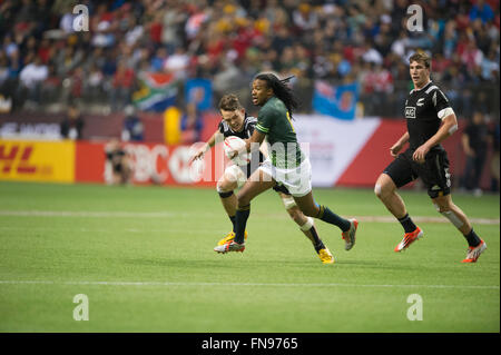 Vancouver, Canada. 13 marzo, 2016. Nuova Zelanda (nero) vs Sud Africa (verdi) durante la HSBC World Rugby Sevens serie finale di coppa, tenutasi in BC Place, Vancouver B.C Canada - Nuova Zelanda vince 19 - 14 - Credito: GerryRousseau/Alamy Live News Foto Stock