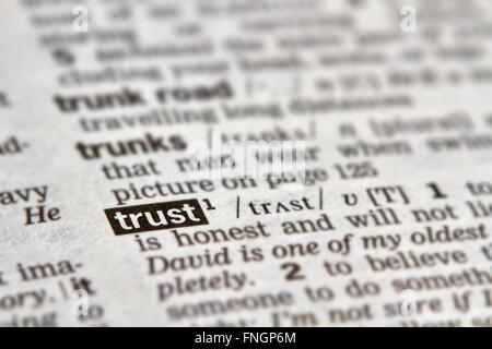 Trust definizione parola di testo nella pagina del dizionario Foto Stock