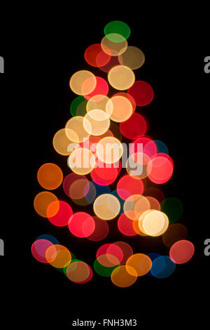 Multicolore decorativa bokeh di fondo sull'albero di Natale Foto Stock
