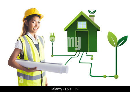 Immagine composita di architetto donna con casco giallo e piani Foto Stock