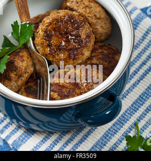 Cotolette di piccole dimensioni o di polpette di salsiccia Foto Stock