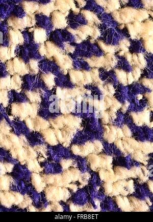Macro estreme del bianco e del blu di fibre tessili. Struttura in fibra. Struttura tessile. Foto Stock