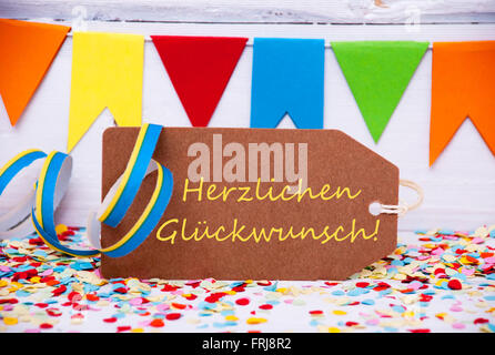 Etichetta con decorazione di partito, Testo mezzi Glueckwunsch congratulazioni Foto Stock