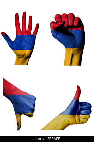 Le mani con più gesti (aprire palm, pugno chiuso, pollice in alto e in basso) con l'Armenia bandiera dipinta isolato su bianco Foto Stock