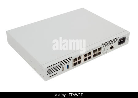 Router industriale isolato su sfondo bianco con porte SFP combinate Foto Stock