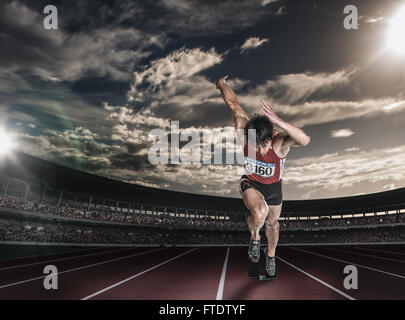 Atleta giapponese in esecuzione su via Foto Stock