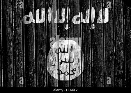 Bandiera di Stato islamico dell Iraq e il levante dipinta sul telaio in legno Foto Stock