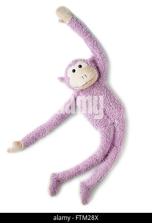 Scatto dall'alto di un rosa giocattolo di scimmia Foto Stock