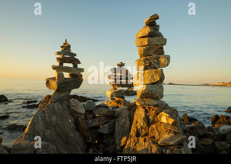 Rock pile a sunrise in segale, New Hampshire USA durante i mesi primaverili. Foto Stock