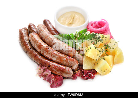 Salsicce alla griglia con patate e salsa Foto Stock