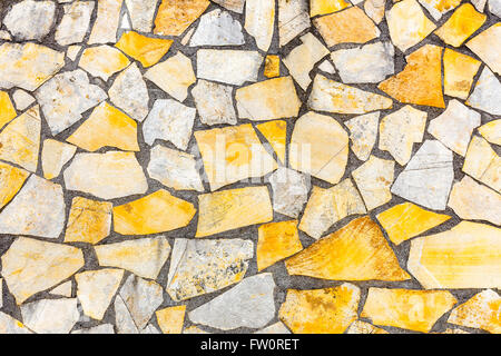 Forme diverse di pietre in mattoni o muratura come parete di sfondo Foto Stock