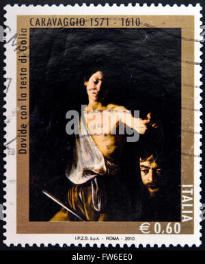 Italia - circa 2010: un timbro stampato in Italia mostra Davide con la testa di Golia di Caravaggio, circa 2010 Foto Stock