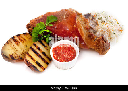 Arrosto di maiale con patate e crauti. Foto Stock